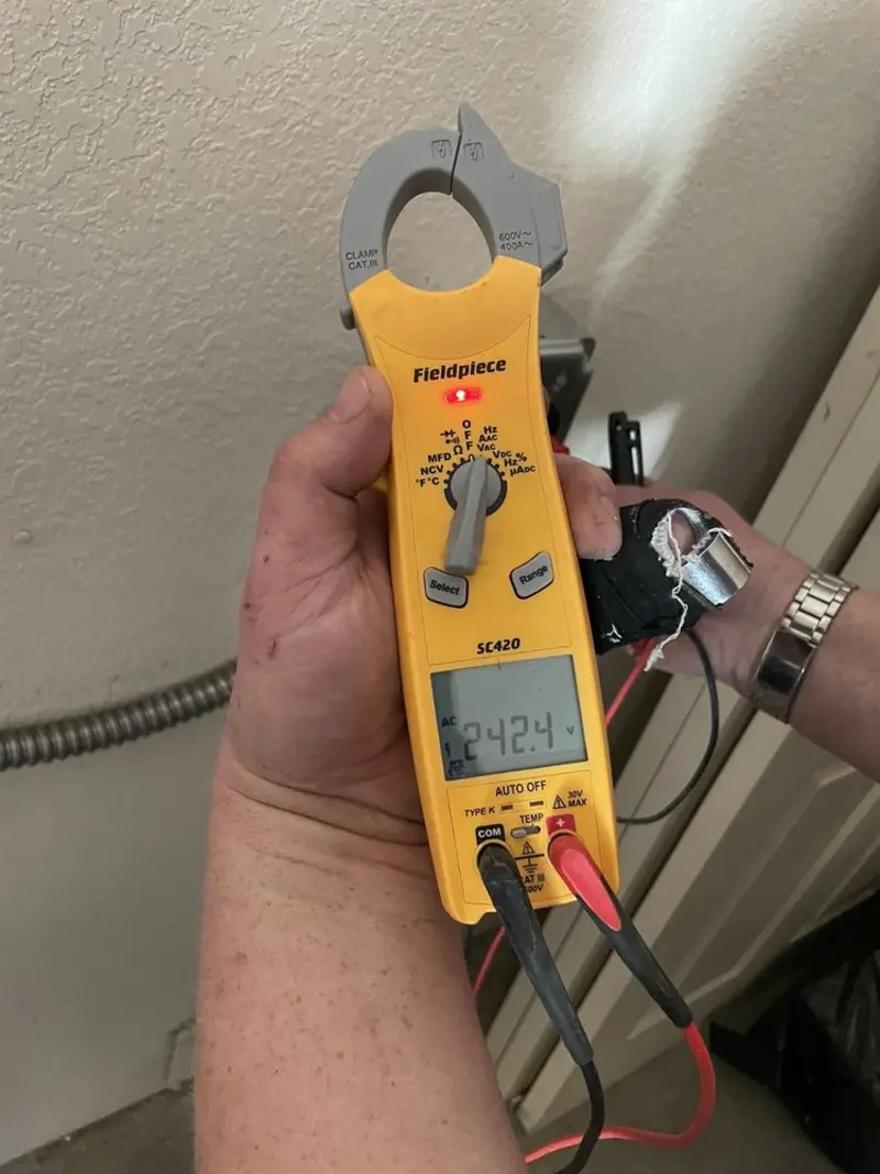 Voltage testing with clamp meter during Generator Installation in Edgerton